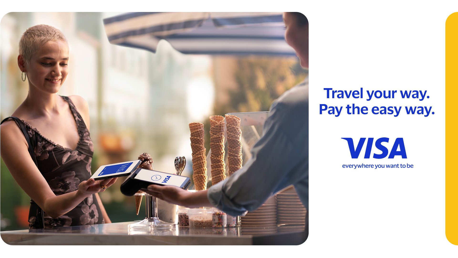 Woman paying with a VISA electronic card