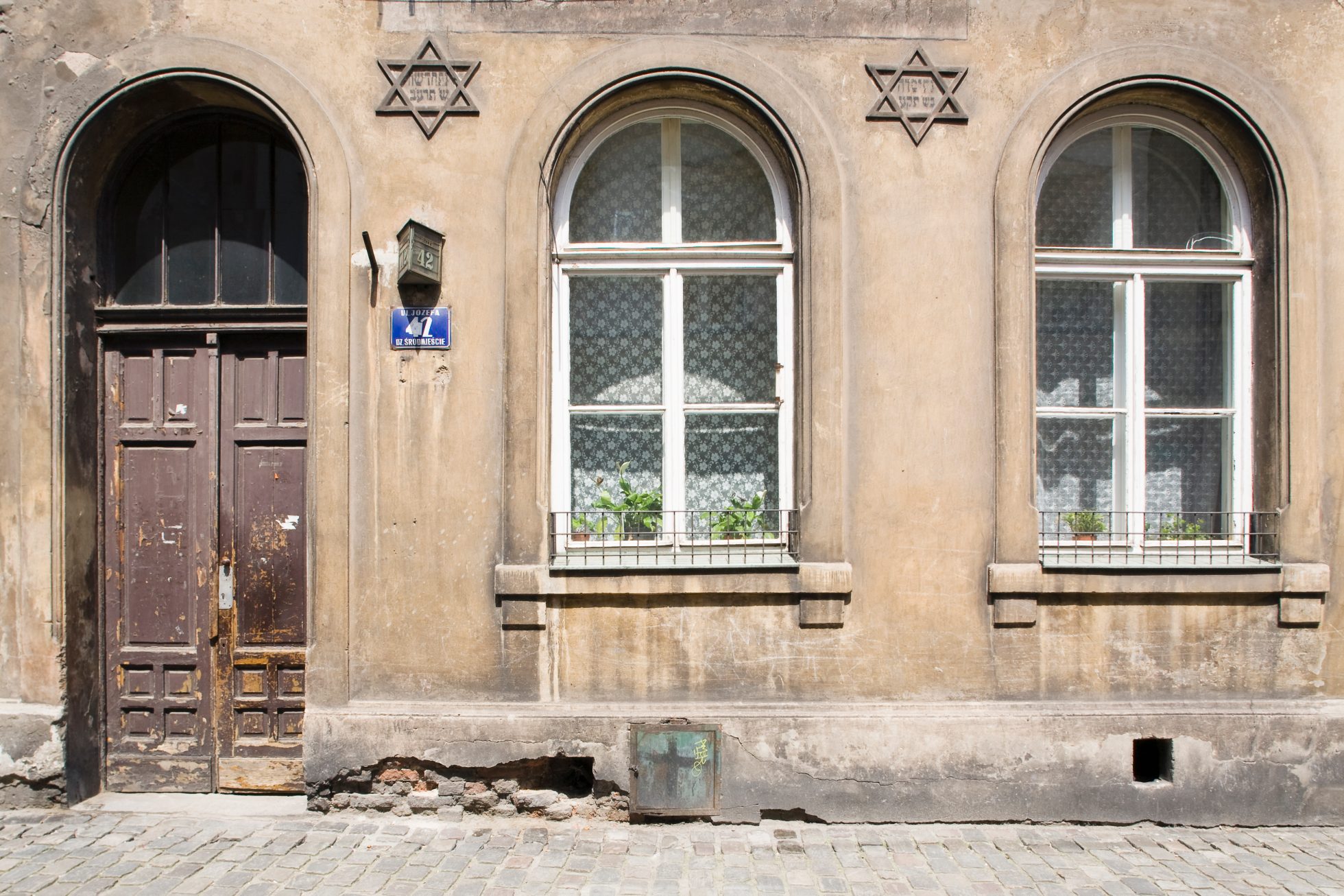 An old Jewish house showing the Hebrew Star of David in Kazimierz, Krakow, Poland, Eastern Europe