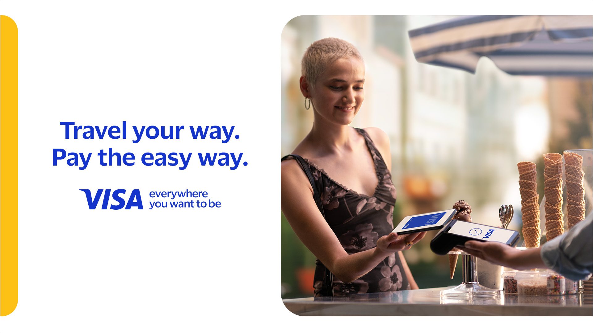 Woman paying with a VISA electronic card