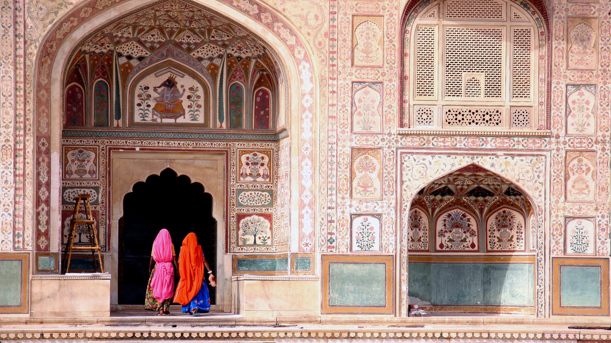 Two women walking around Amber Fort, Jaipur