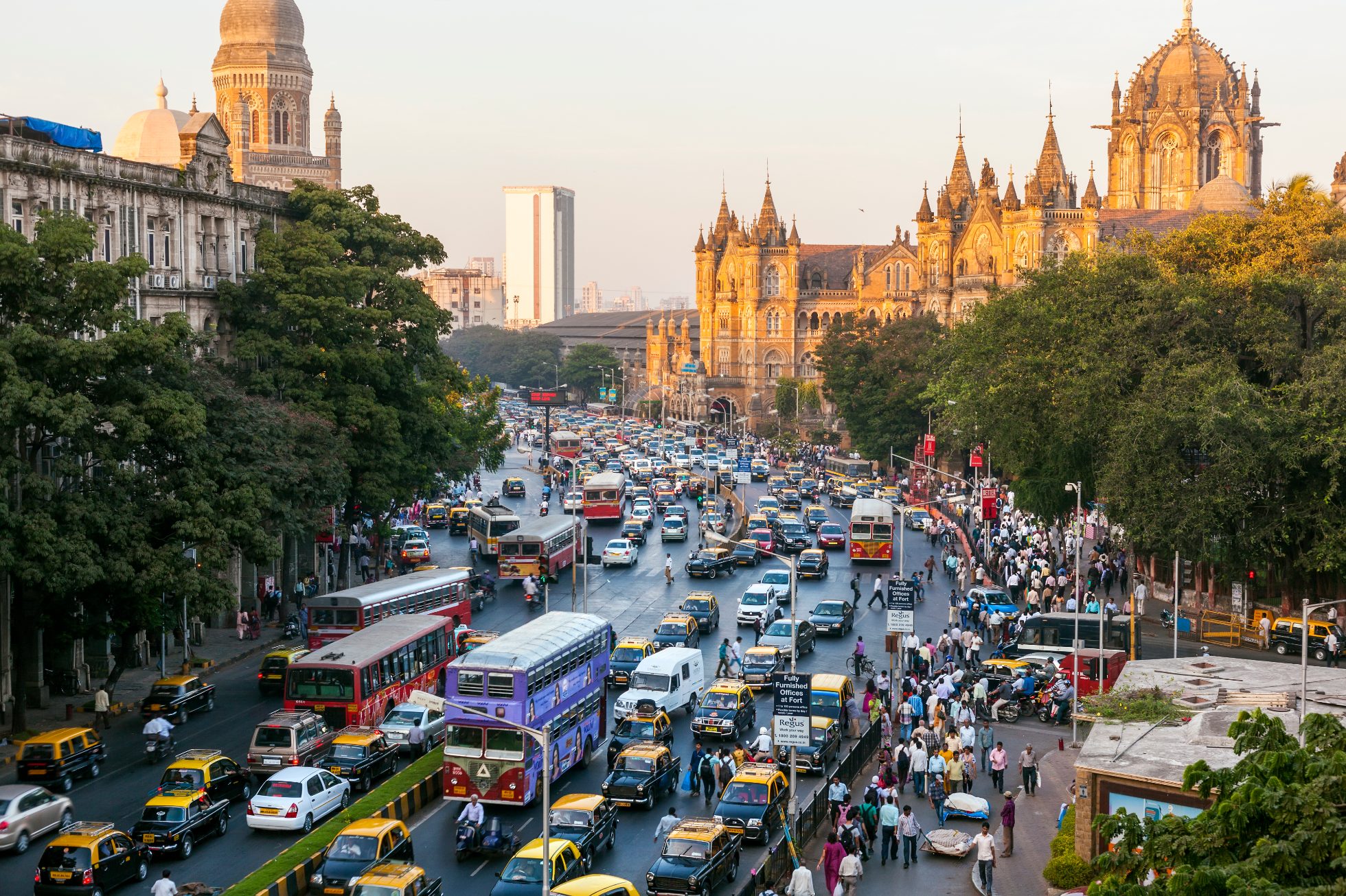Busy Mumbai Street and Victoria Train Station