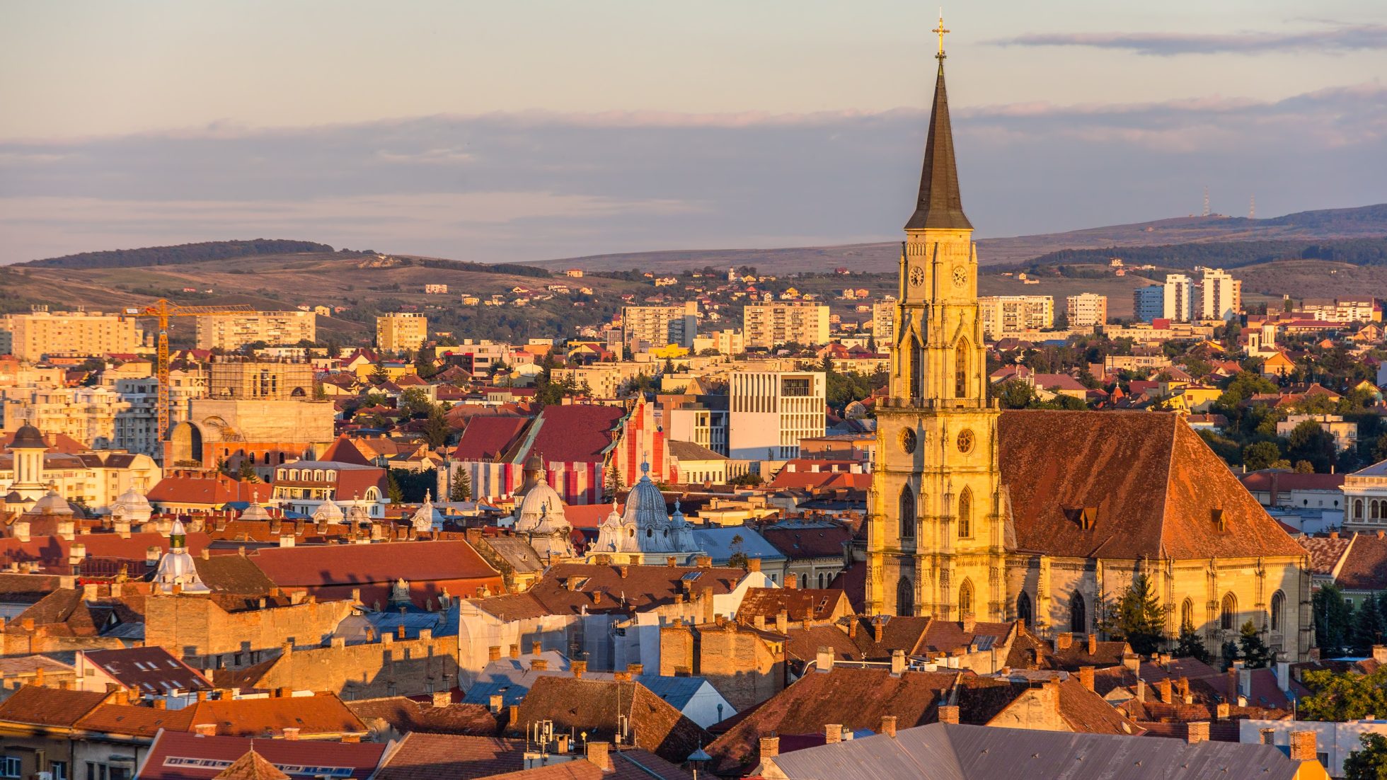 Uniri Square with the church of St. Michał in Kuj-Napoce