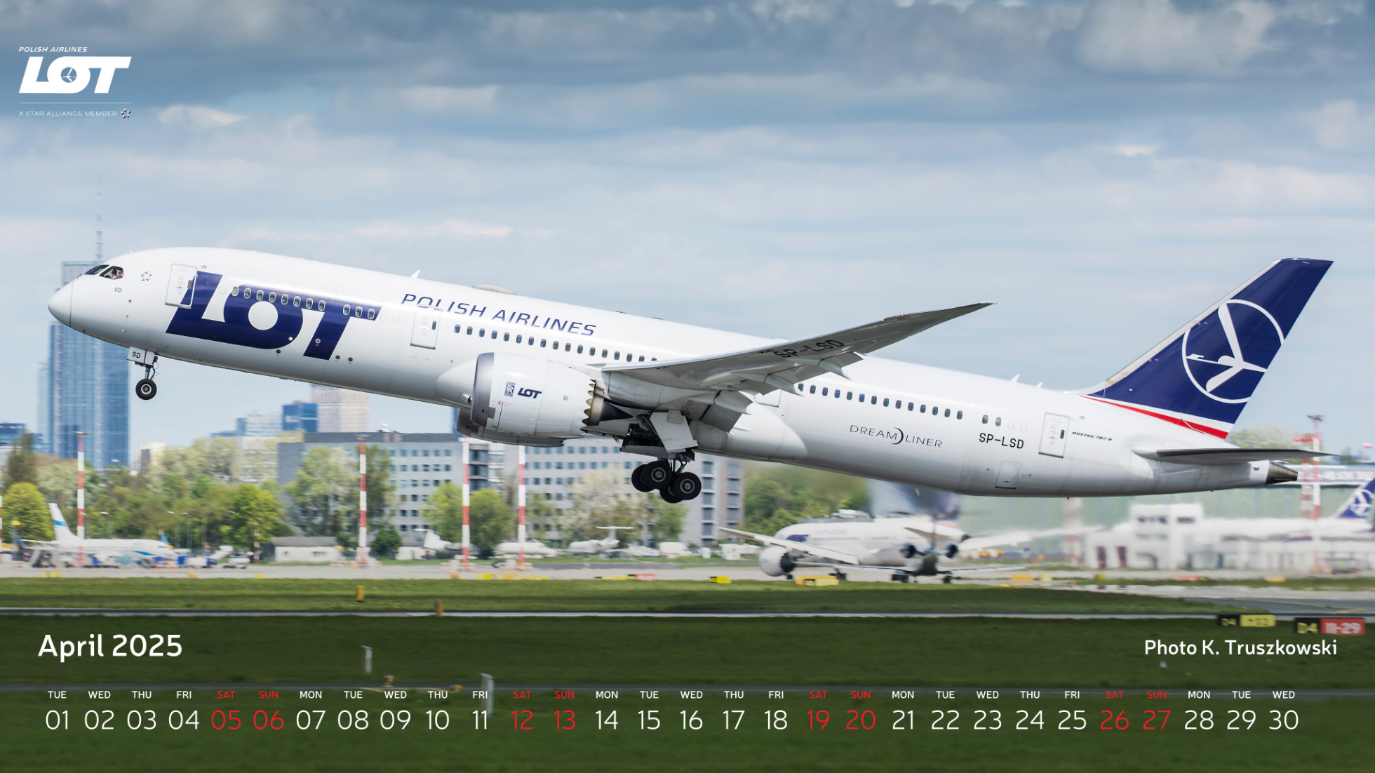 LOT Polish Airlines' Boeing 787 Dreamliner taking off on a sunny day from Chopin Airport with Warsaw in the background