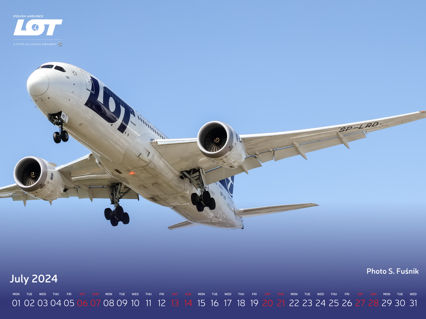 Passenger plane of LOT Polish Airlines against a clear sky.