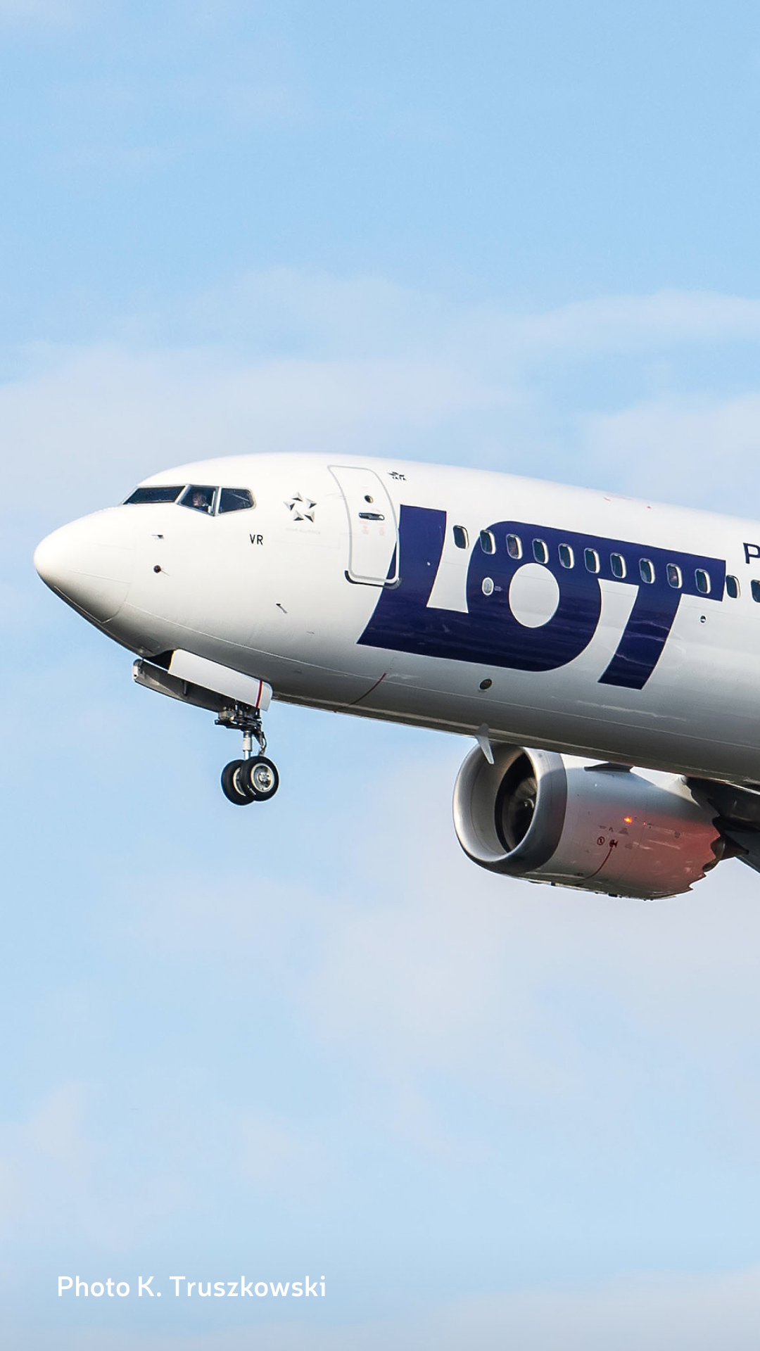 Boeing 737 MAX 8 aircraft approaching landing with blue sky in the background