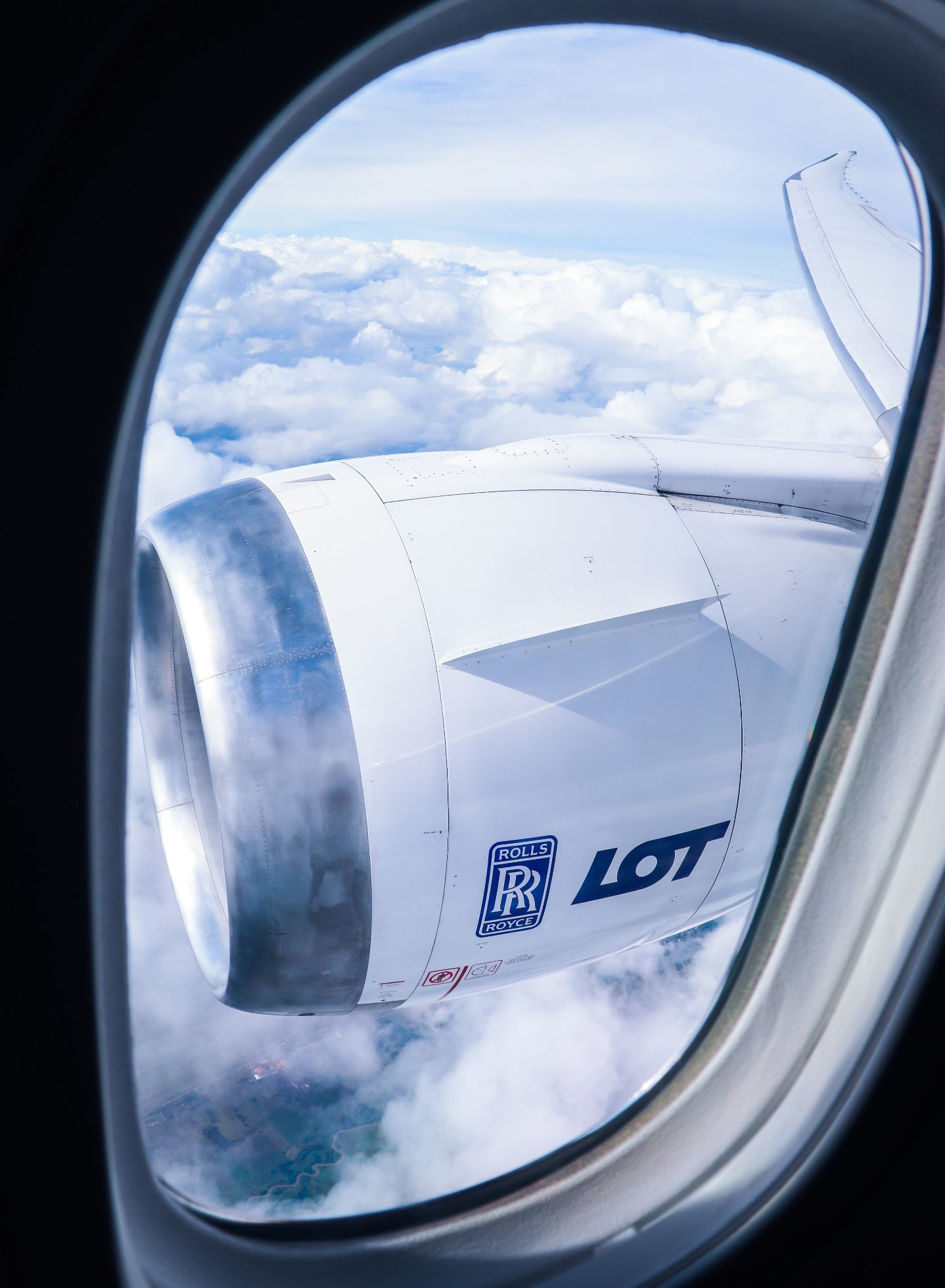 Mobile wallpaper: view through the window during flight