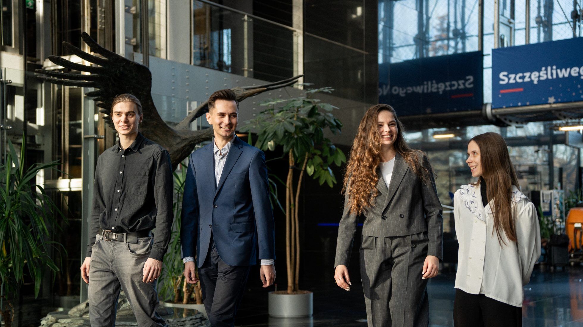 Group of interns in an office setting.