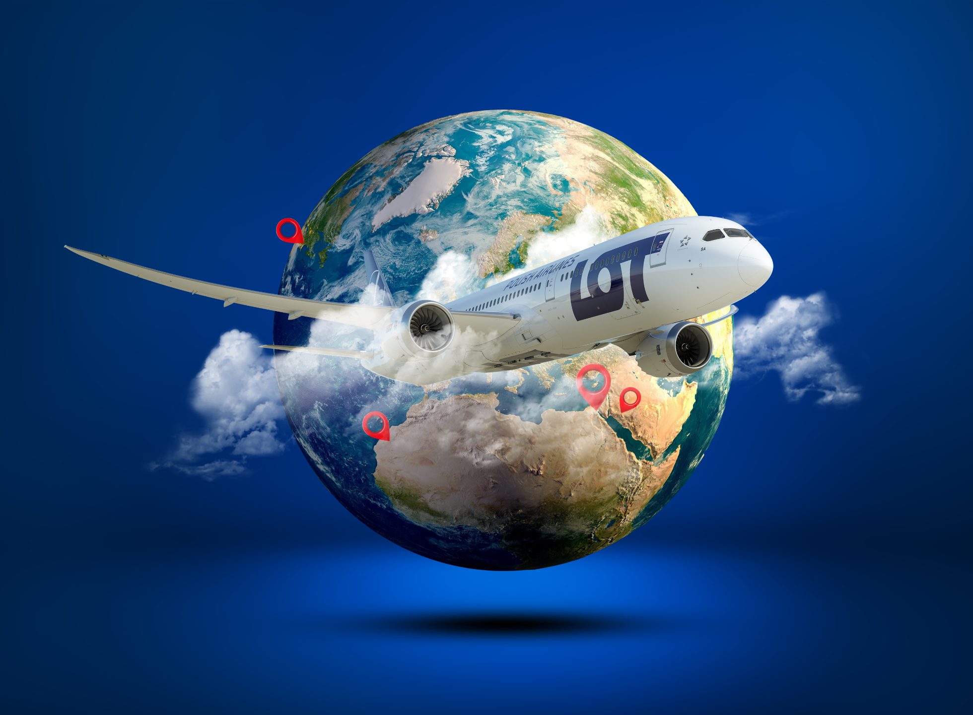 Plane against the background of the globe