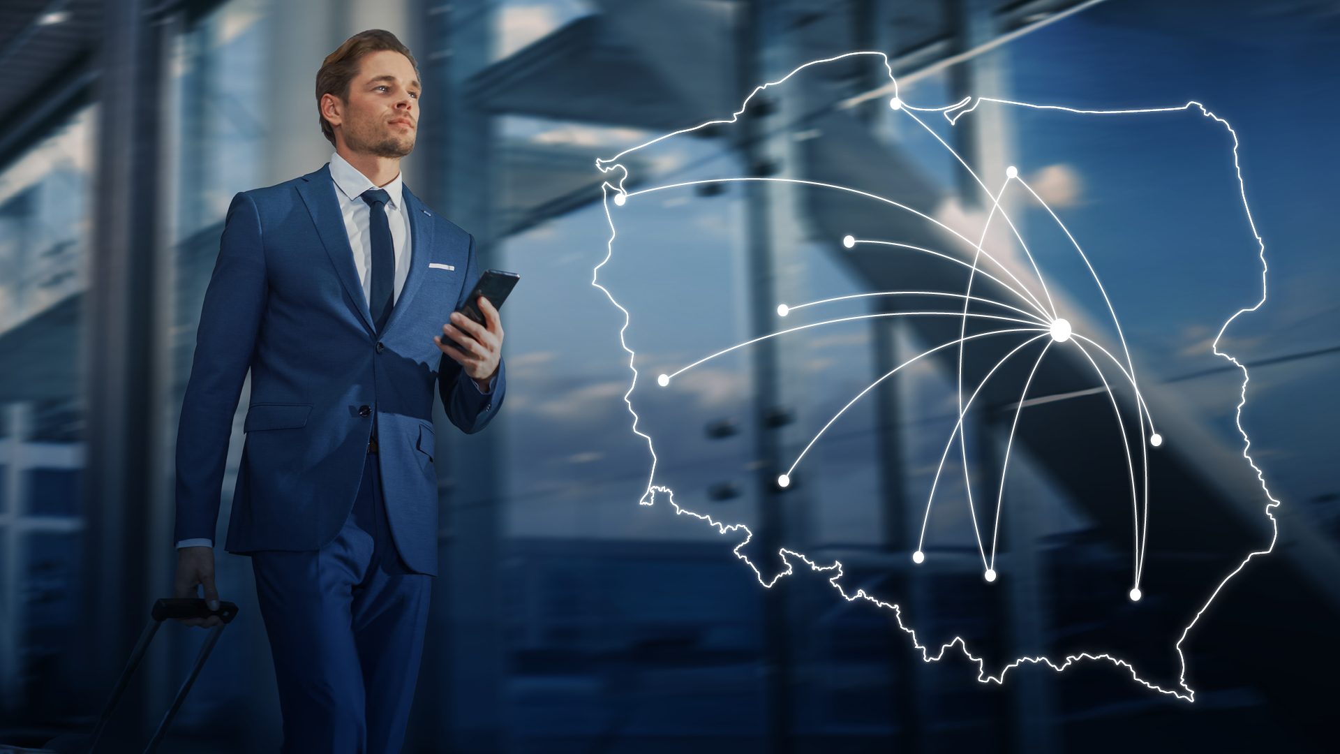 Man is walking on the airport and beside him is map od poland