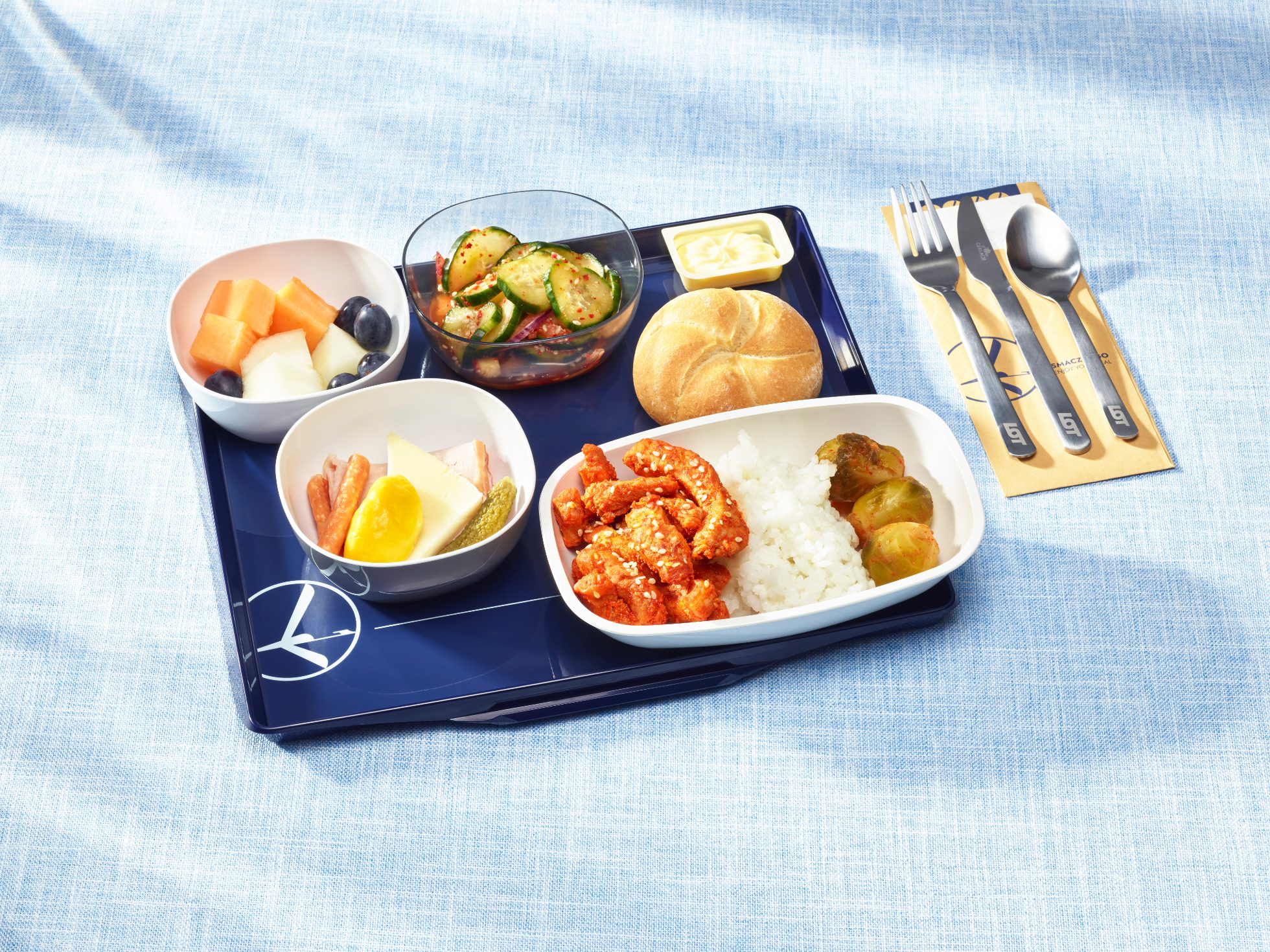 A meal served on a tray in LOT Economy Class on long-haul flights.