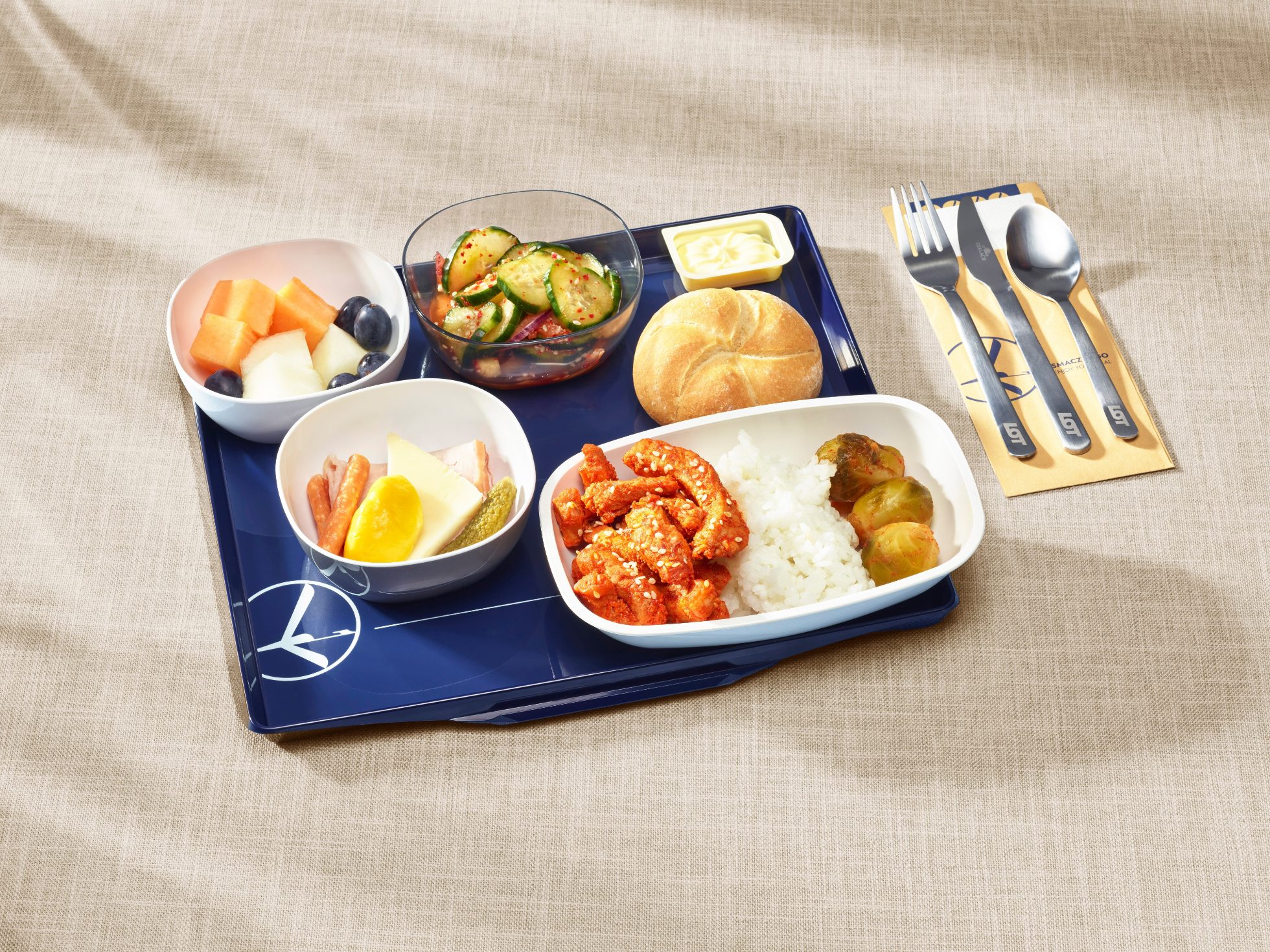 A meal served on a tray in LOT Economy Class on long-haul flights.
