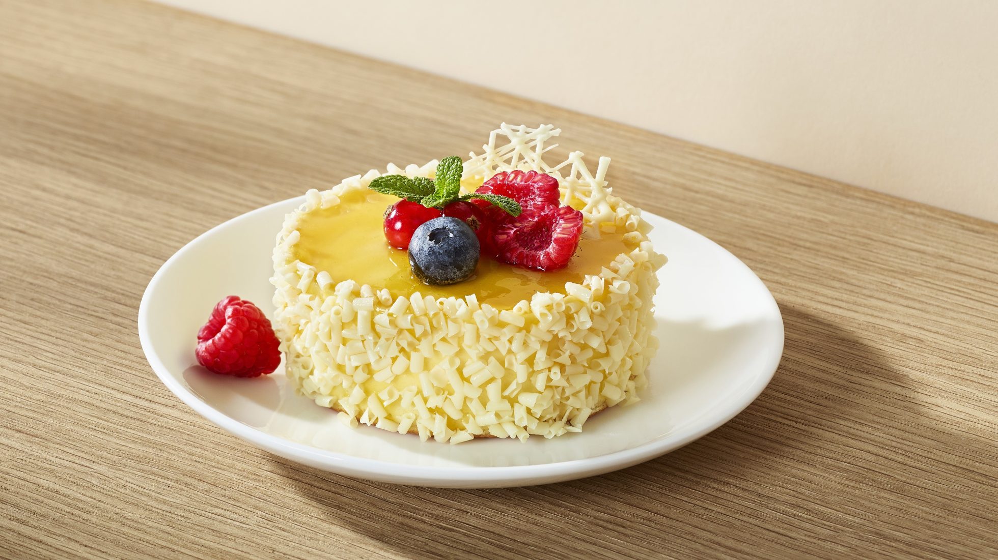 Mango cake with seasonal fruit