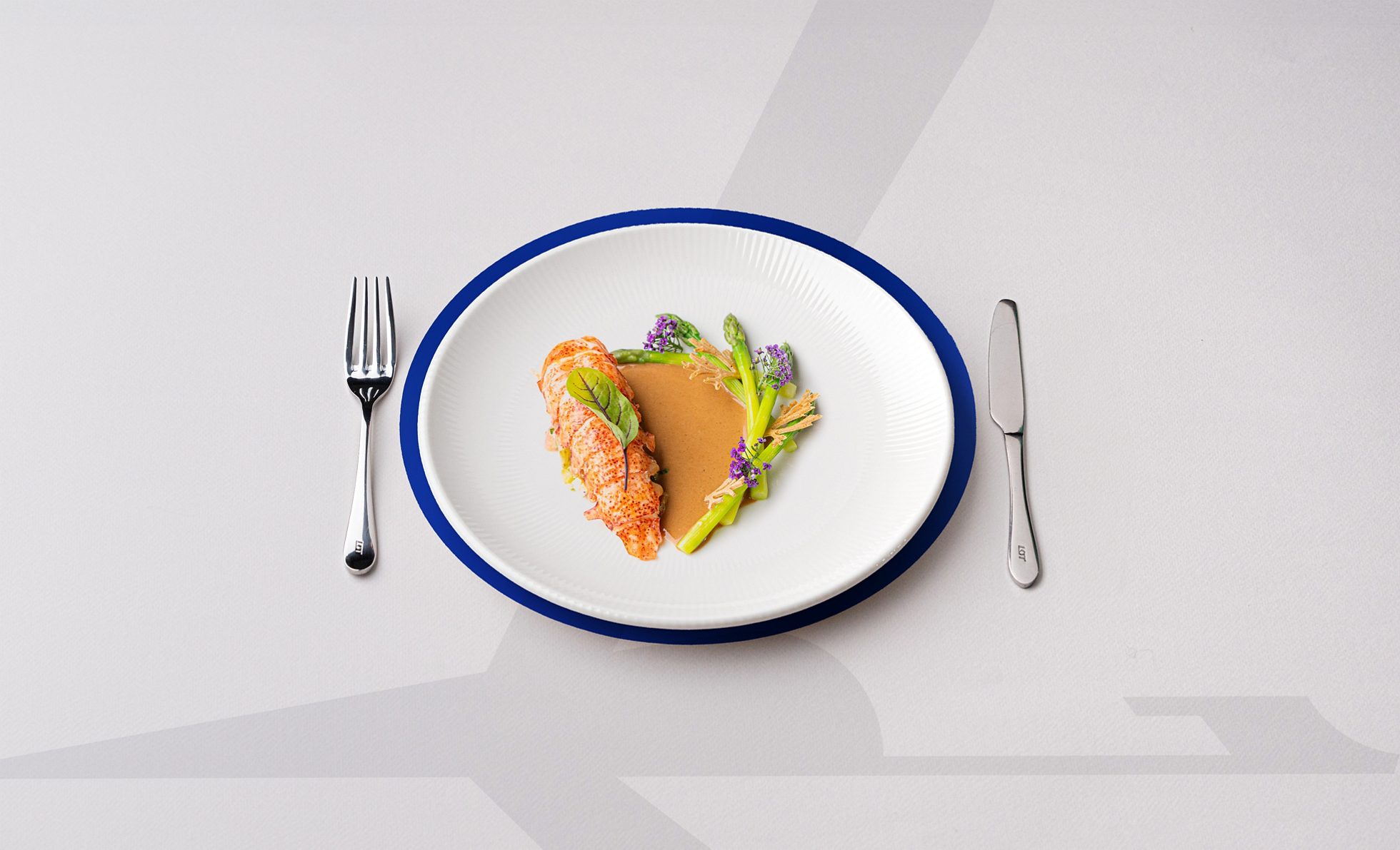 Lobster with green asparagus and vegetable salad