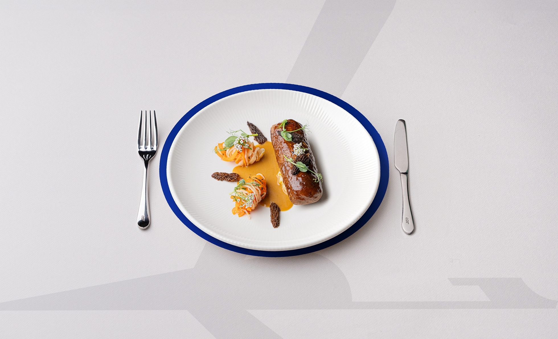 Veal cutlets with apple and goose liver, marinated vegetables, morel sauce
