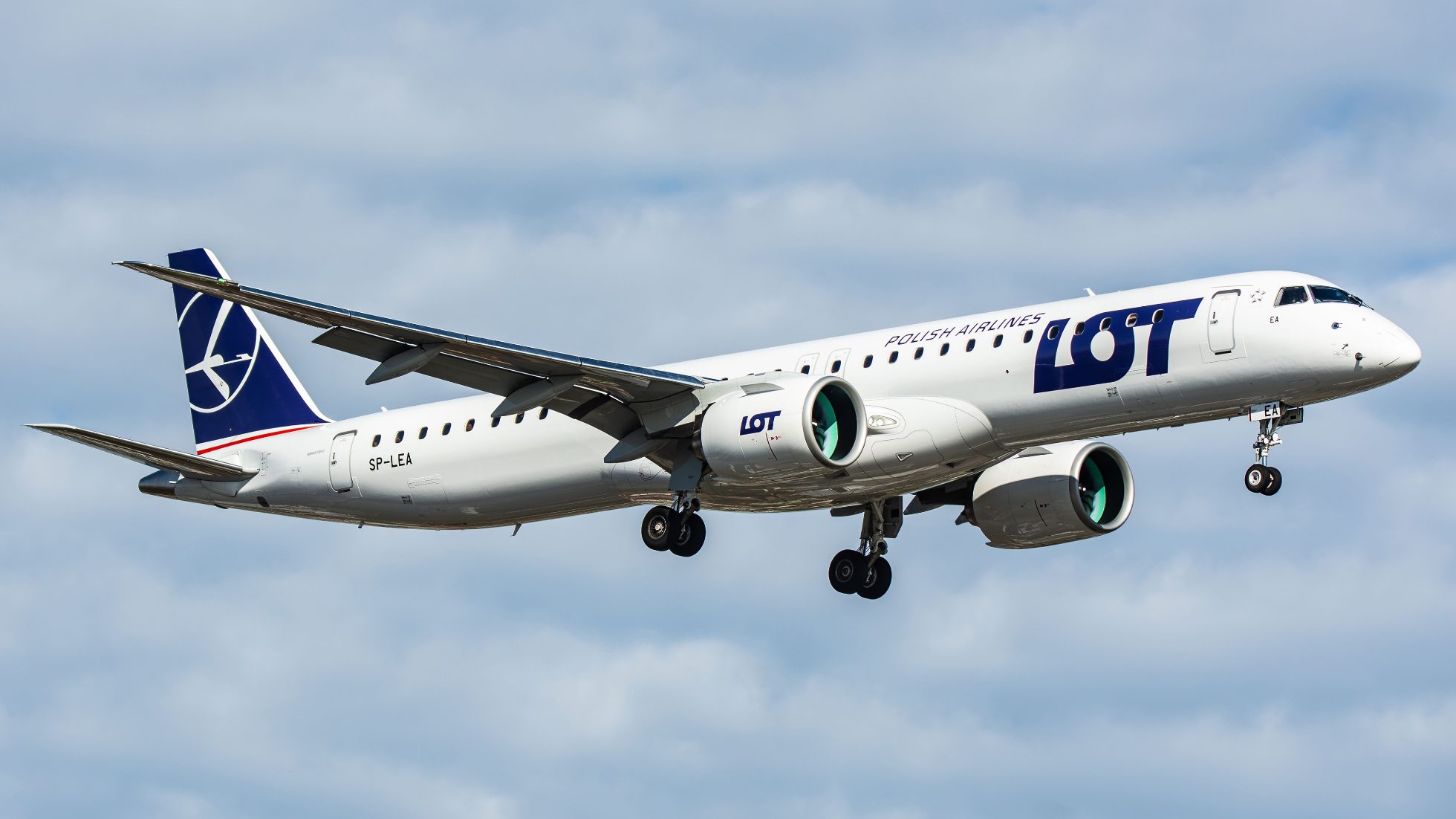 Embraer E2 aircraft at the airport, ready for flight.
