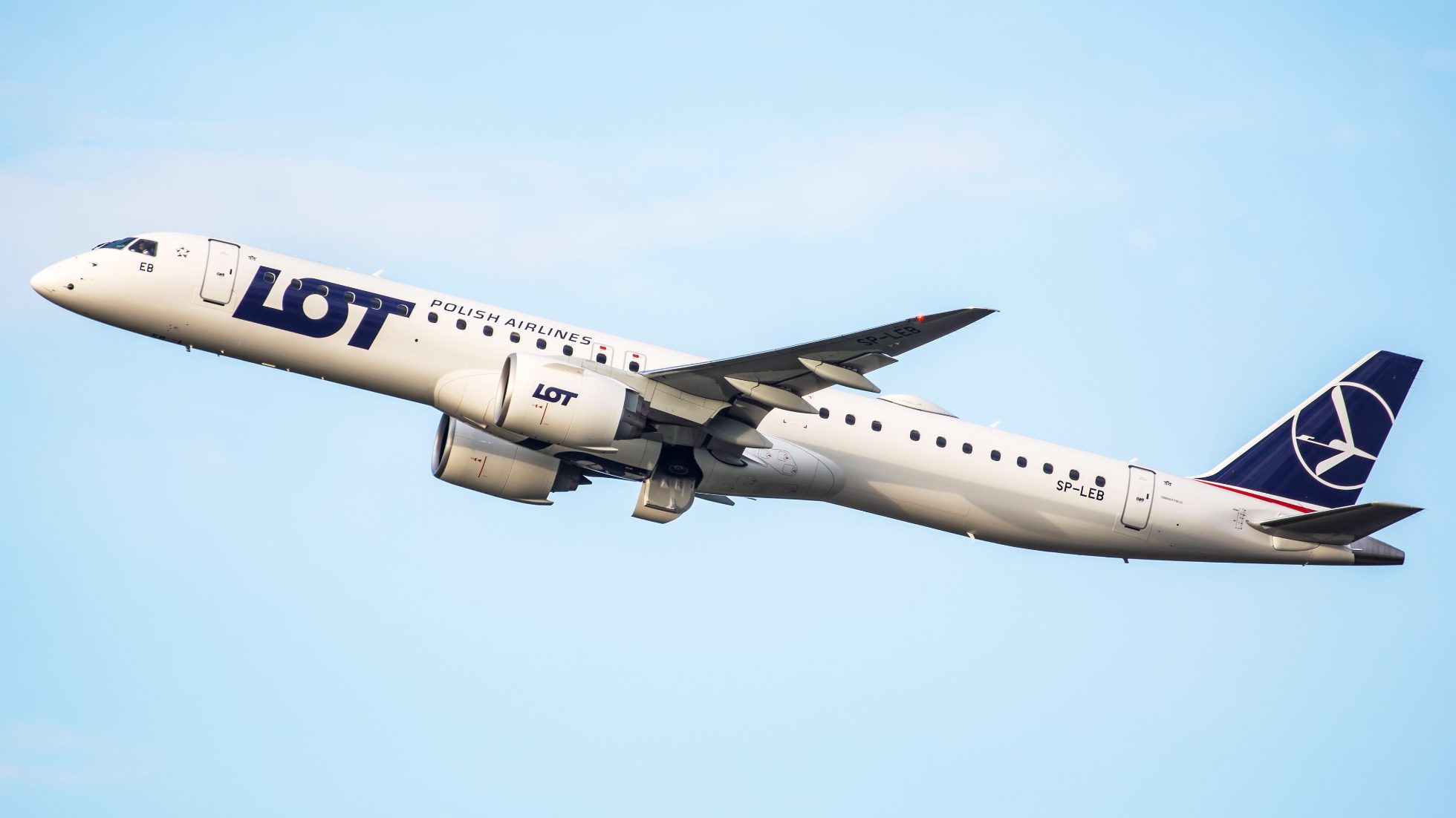 Embraer E2 aircraft at the airport, ready for flight.