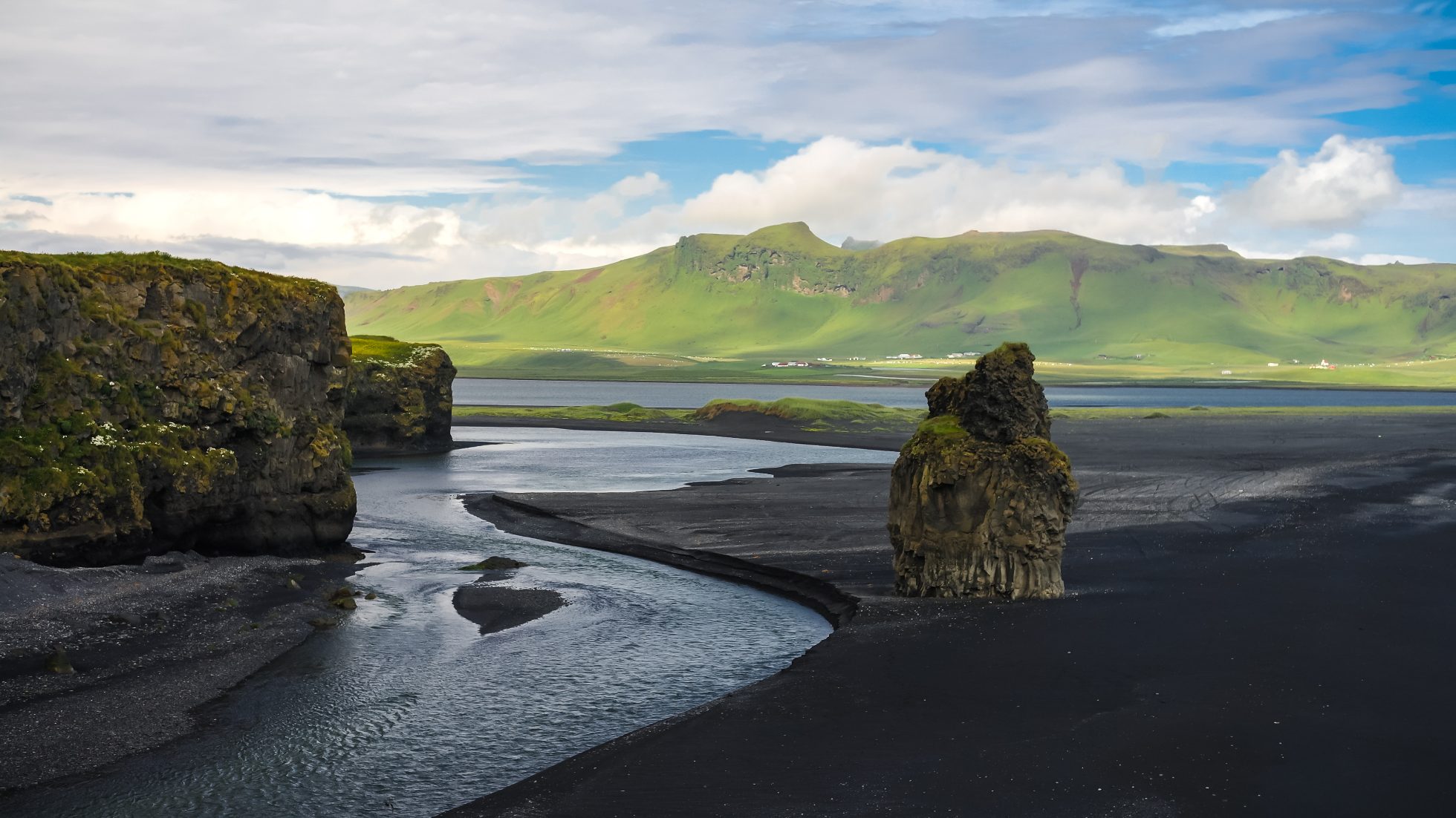 Landscape of Dyrholaey cape, volcanic sand beach, South Iceland
