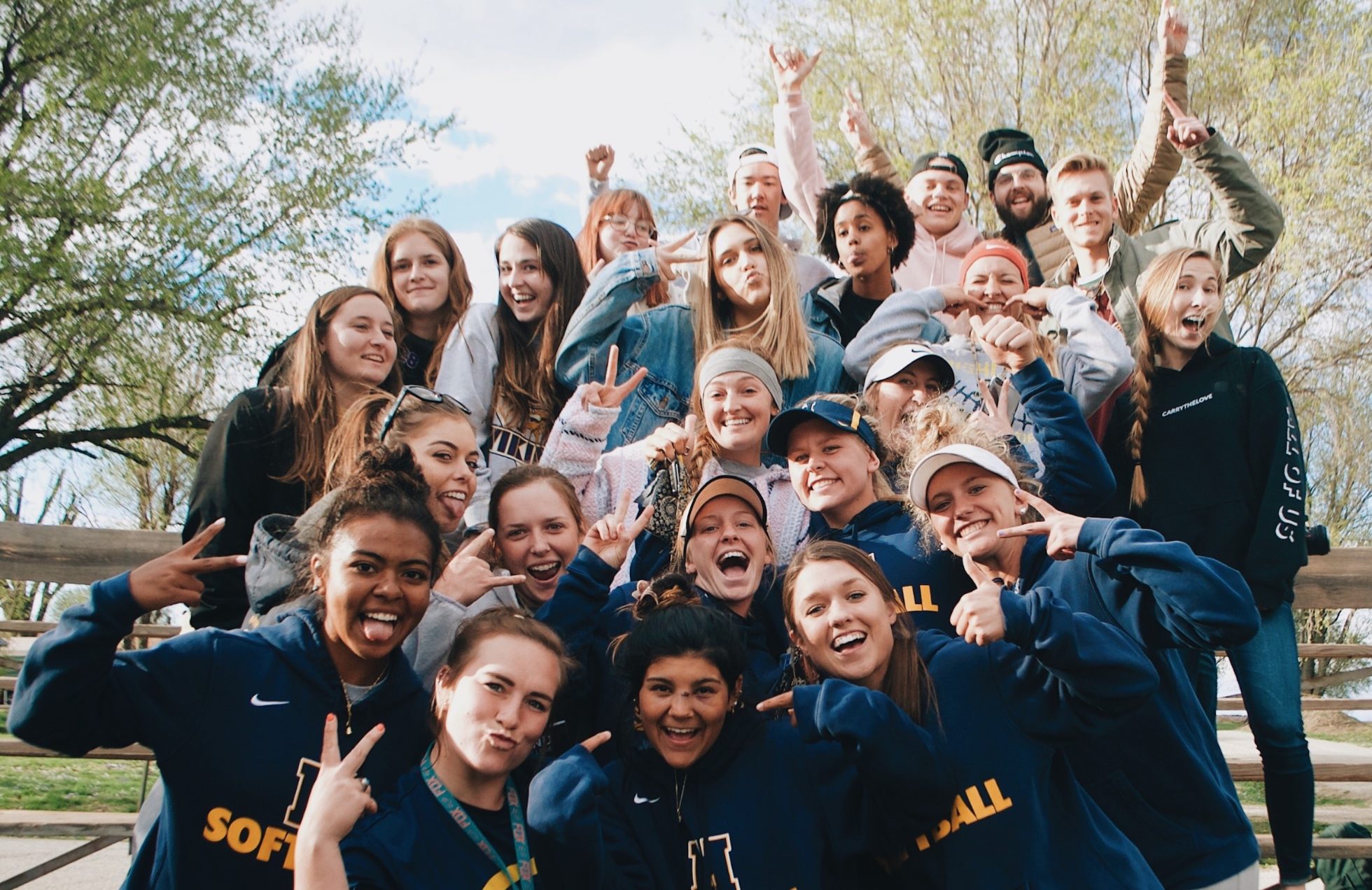 Group of young people posing on a school trip