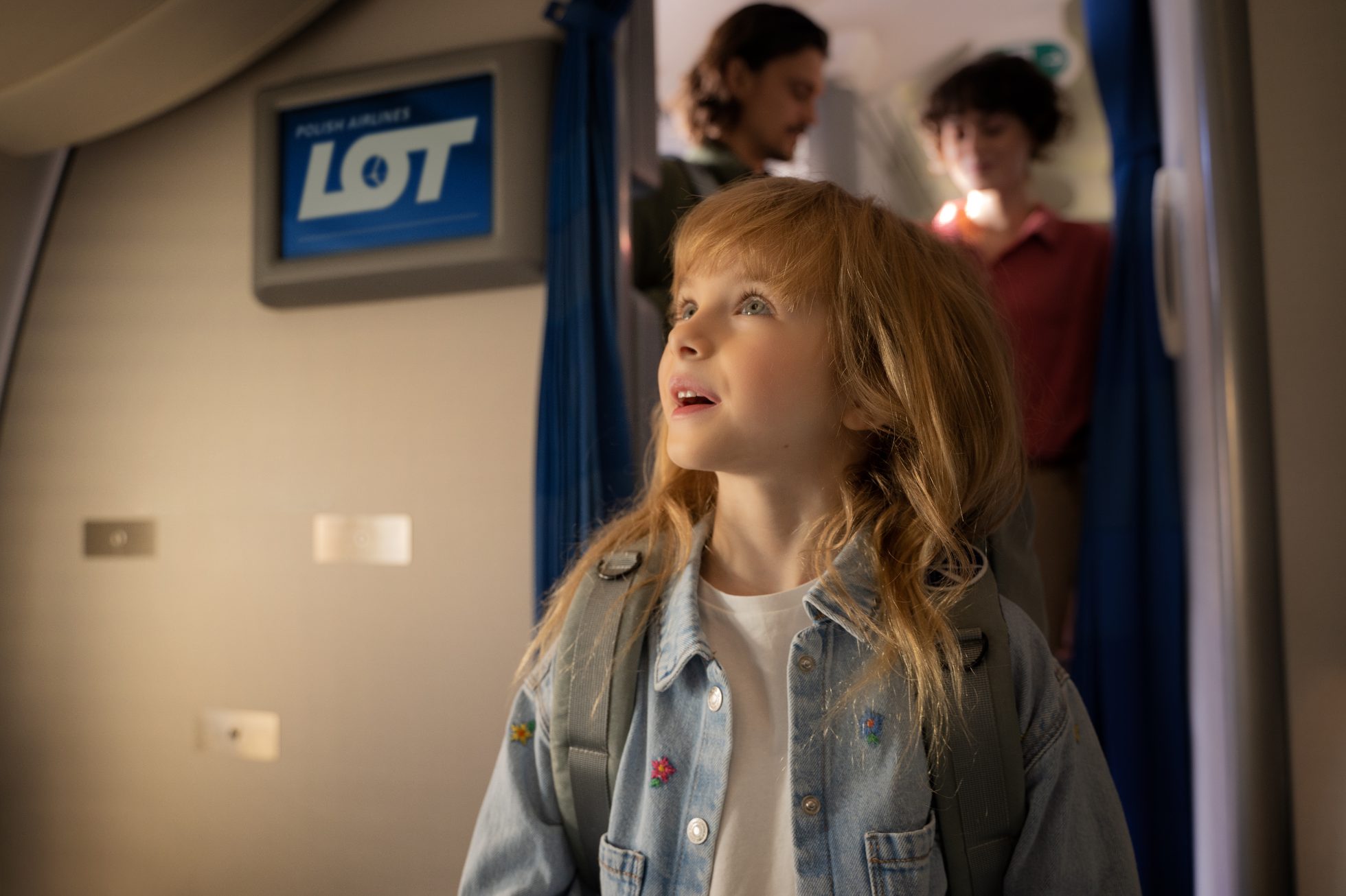 A little girl enjoys children's facilities on board Dreamliner