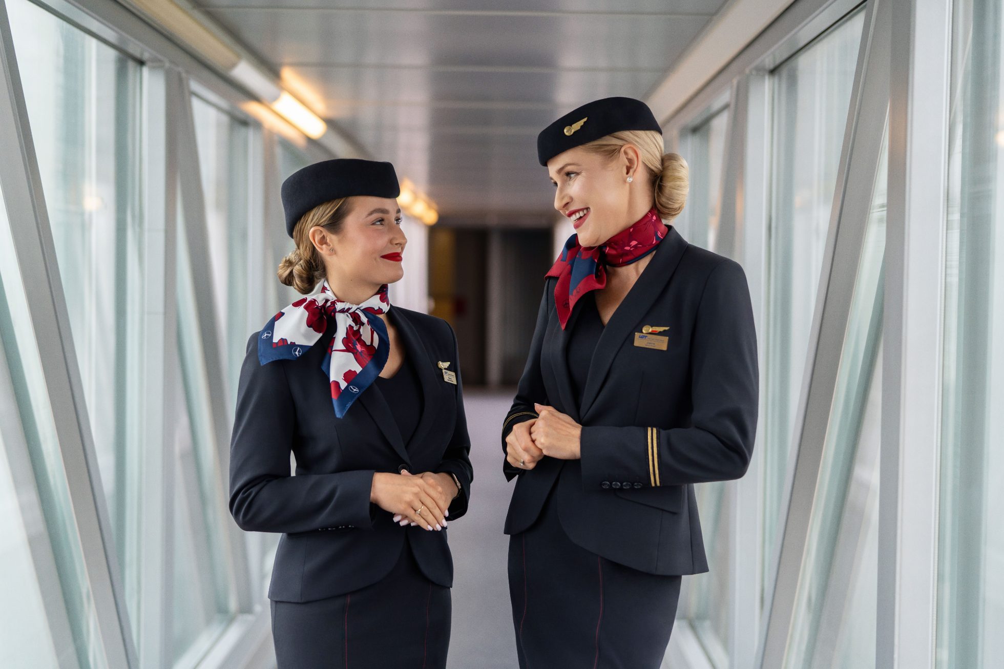 LOT Polish Airlines cabin crew members on board plane