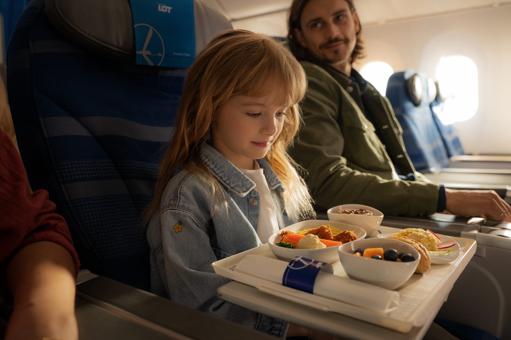 A little girl enjoys children's facilities on board Dreamliner