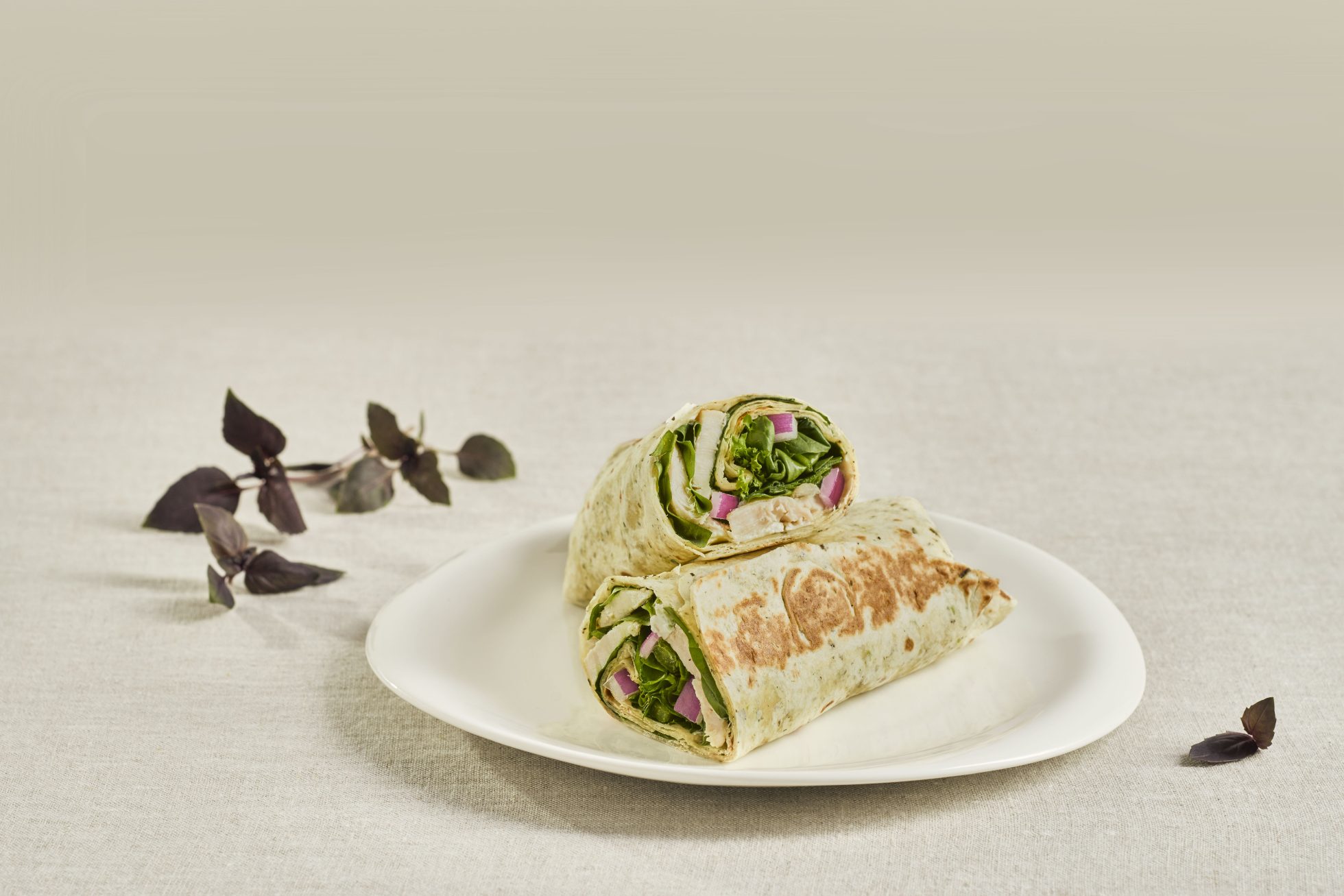 Chicken salad in a tortilla wrap.