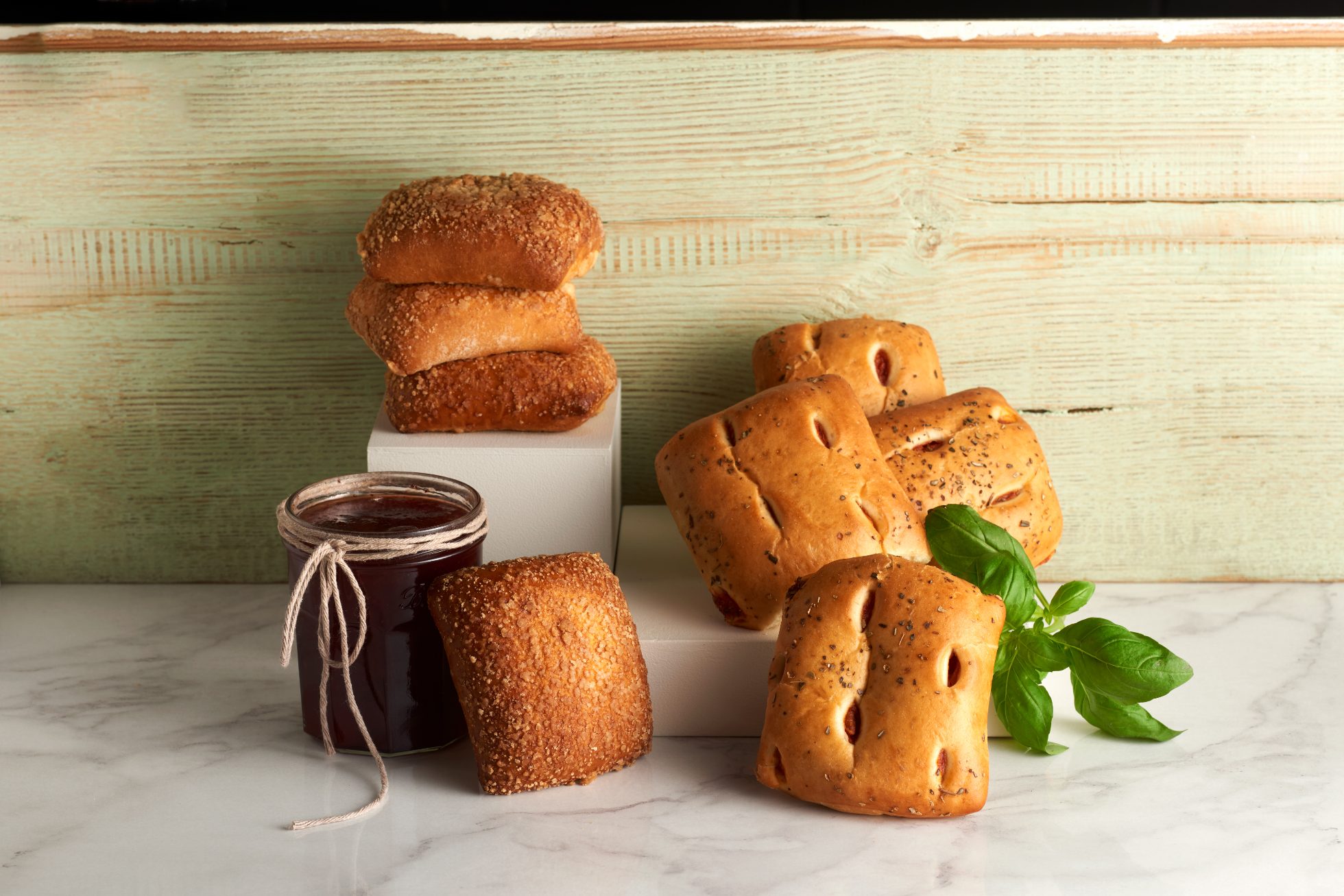 Fragrant yeast rolls, raspberry jam and basil.