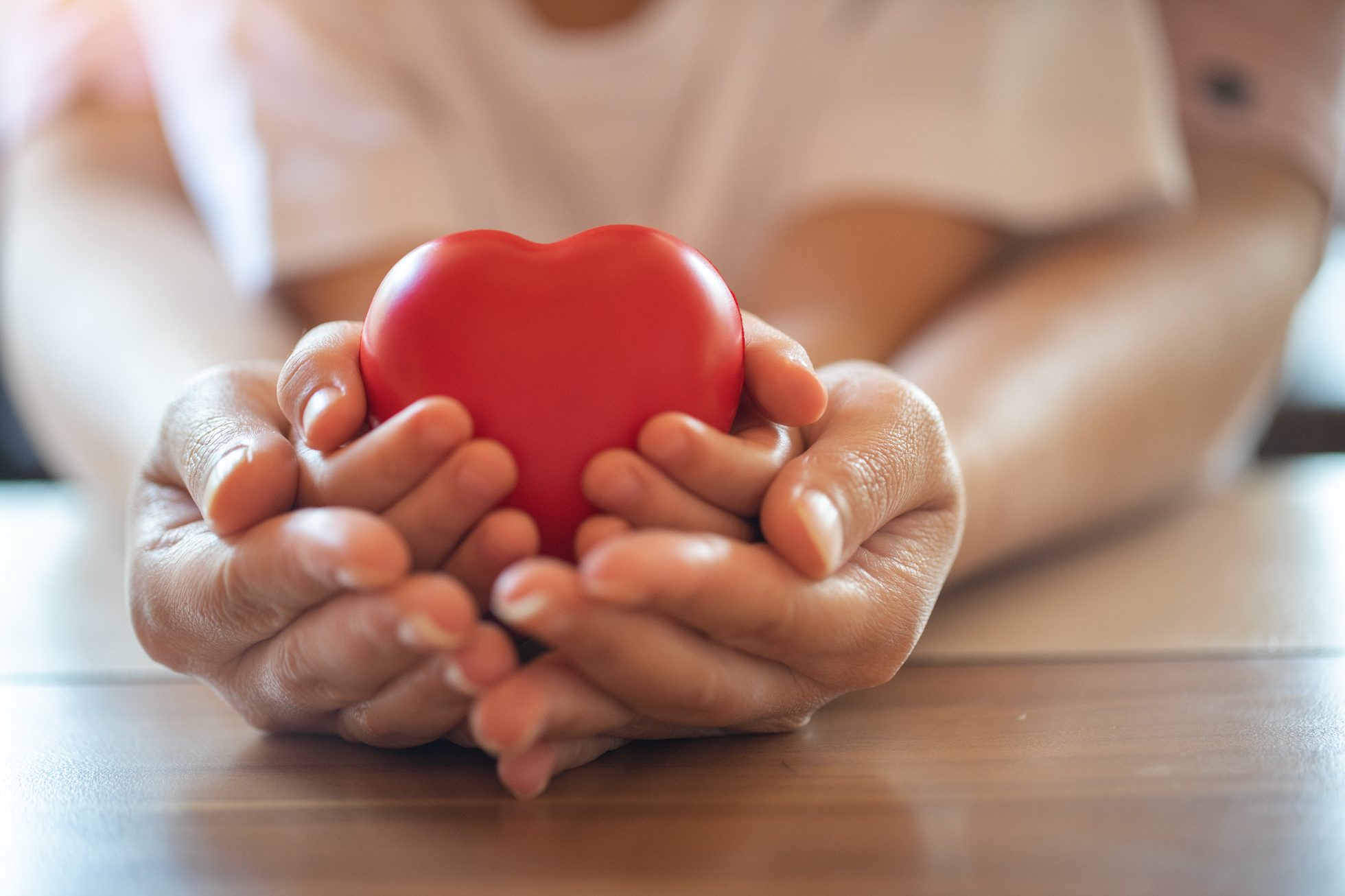 Hands holding heart