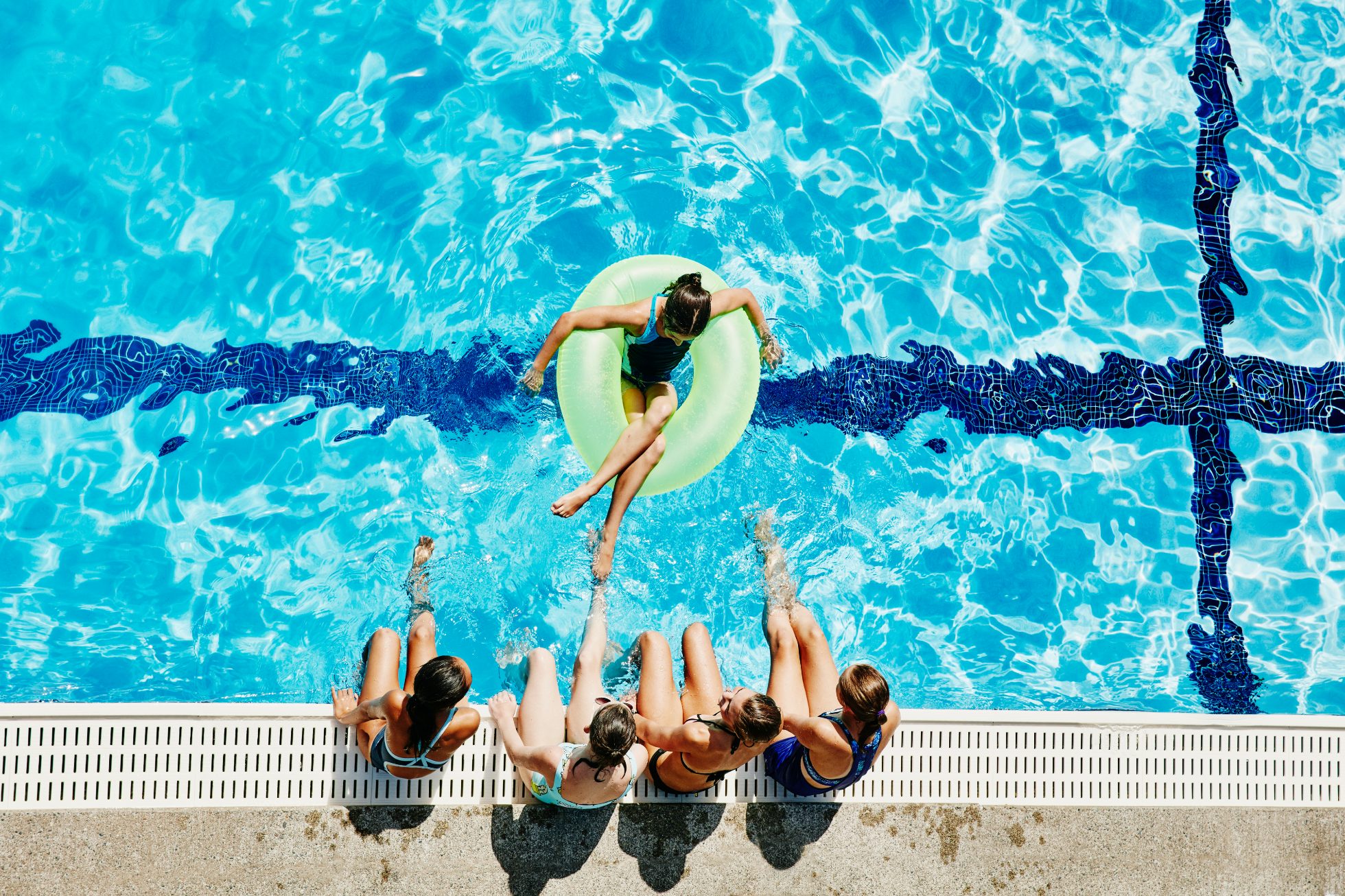 A group of girls at the pool